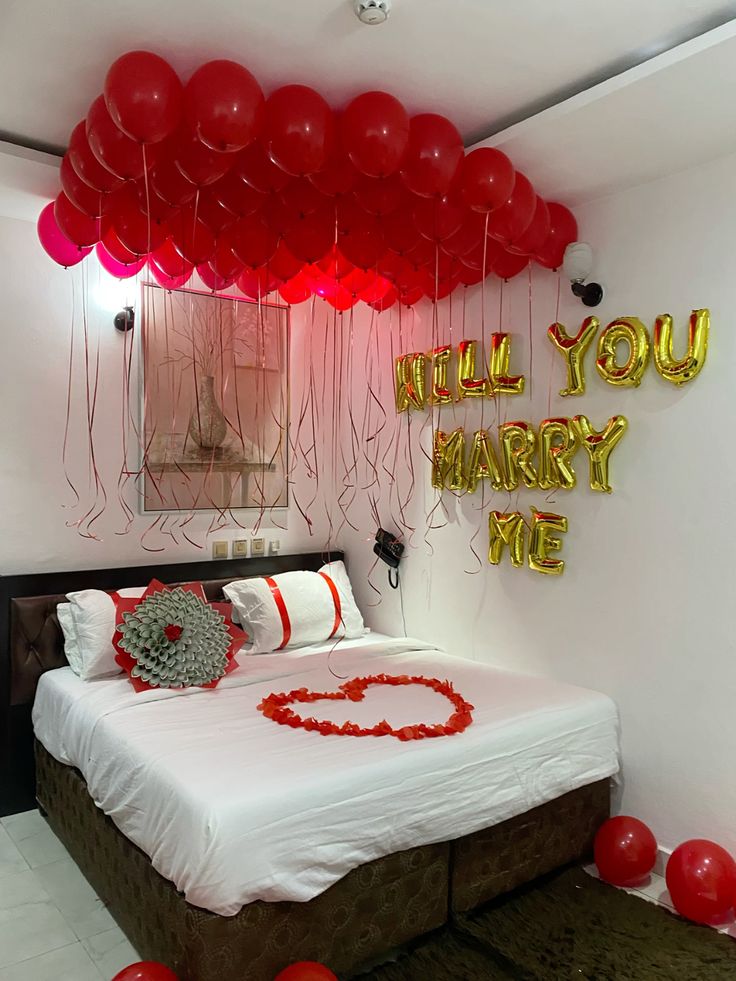Red Ceiling Balloons & Gold 'Marry Me' Room