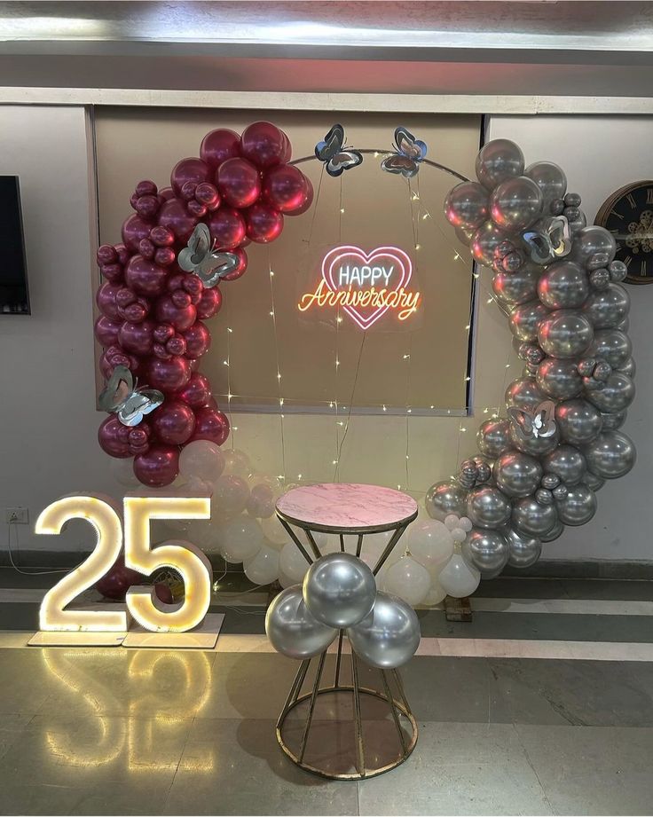 25th Maroon, Silver & Butterfly Ring Arch