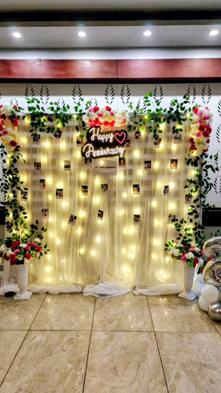 White Tulle Photo Backdrop with Floral Arch