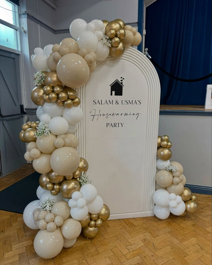 Ivory & Gold Housewarming Arch Decor