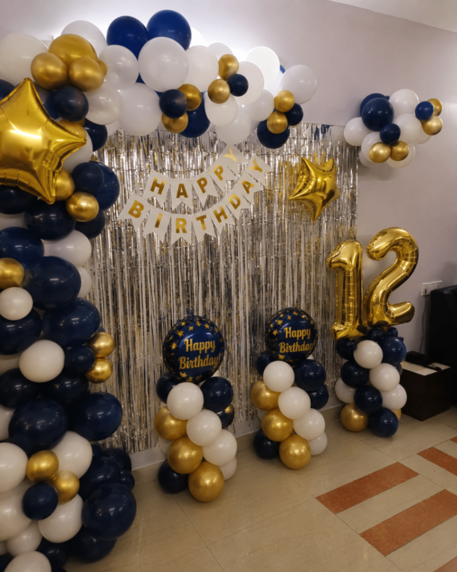 Navy blue and gold twelfth birthday decoration setup