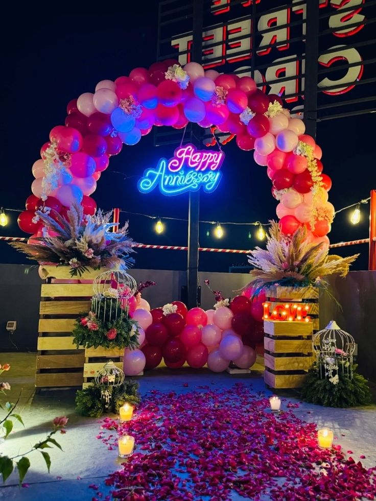 Rooftop Pink Arch with LOVE Marquee & Rose Petal Aisle