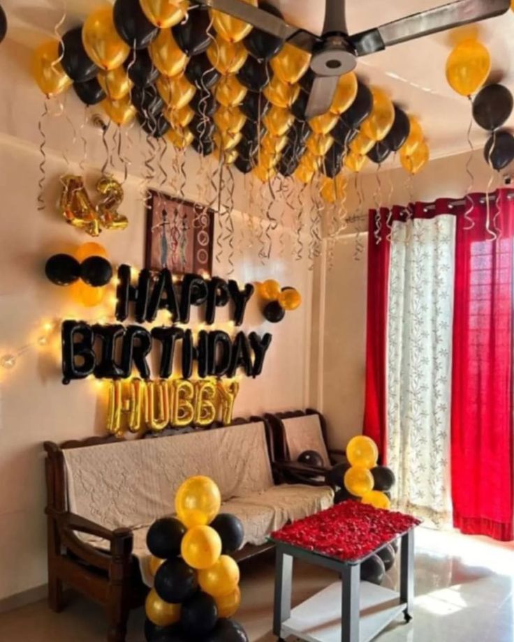 Black & Gold Hubby Surprise Ceiling Balloon Setup