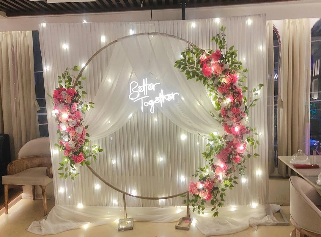 Round Ring Pink Cascade Engagement Backdrop