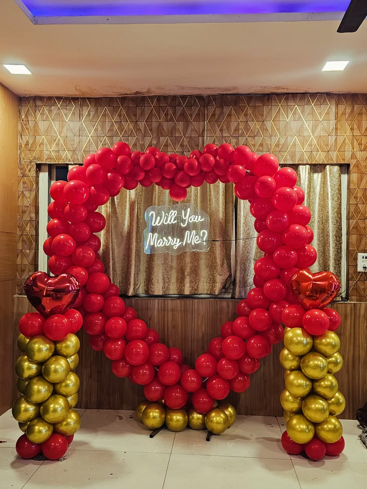 Red & Gold Heart Arch with Balloon Pillars