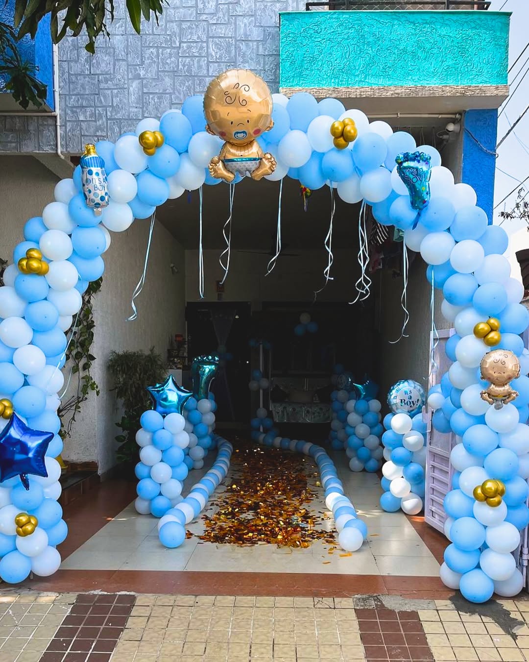 Blue & Gold Outdoor Balloon Arch with Golden Petal Path