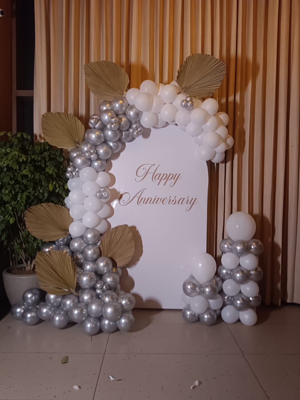 Elegant White & Silver Palm Arch