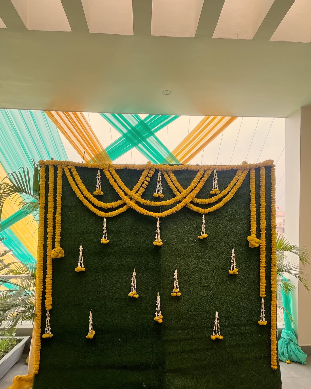 Grass Wall Marigold Swag Backdrop