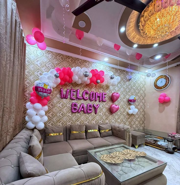 Pink & White 'Welcome Baby' Living Room Setup