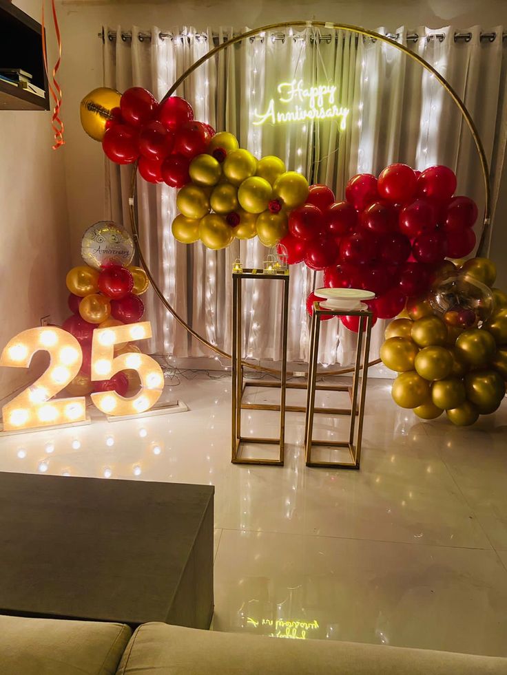 25th Red & Gold Ring with Fairy Curtain Backdrop