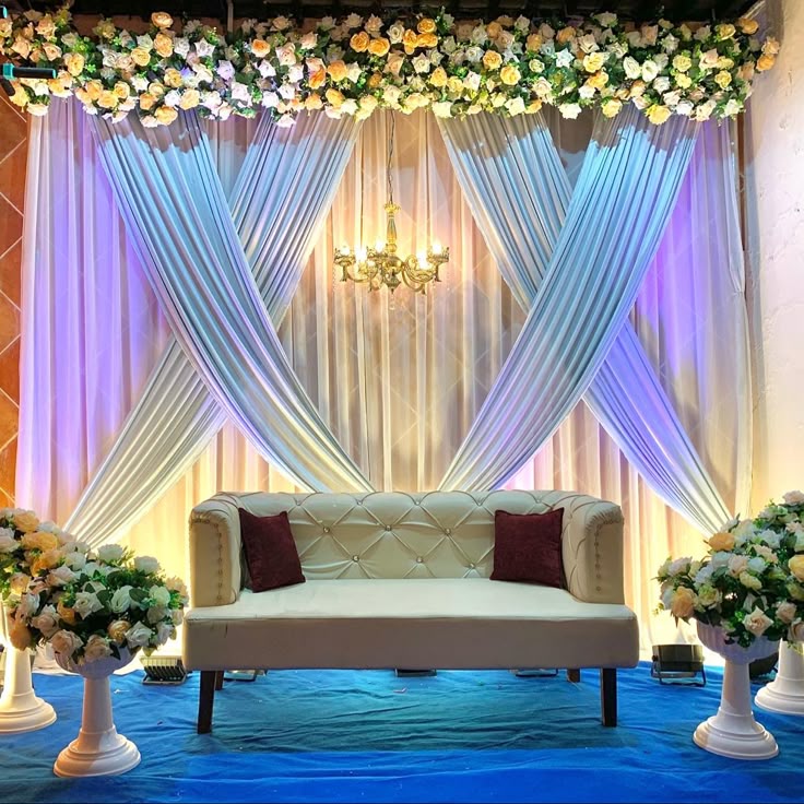 Pastel Chandelier Criss-Cross Engagement Stage